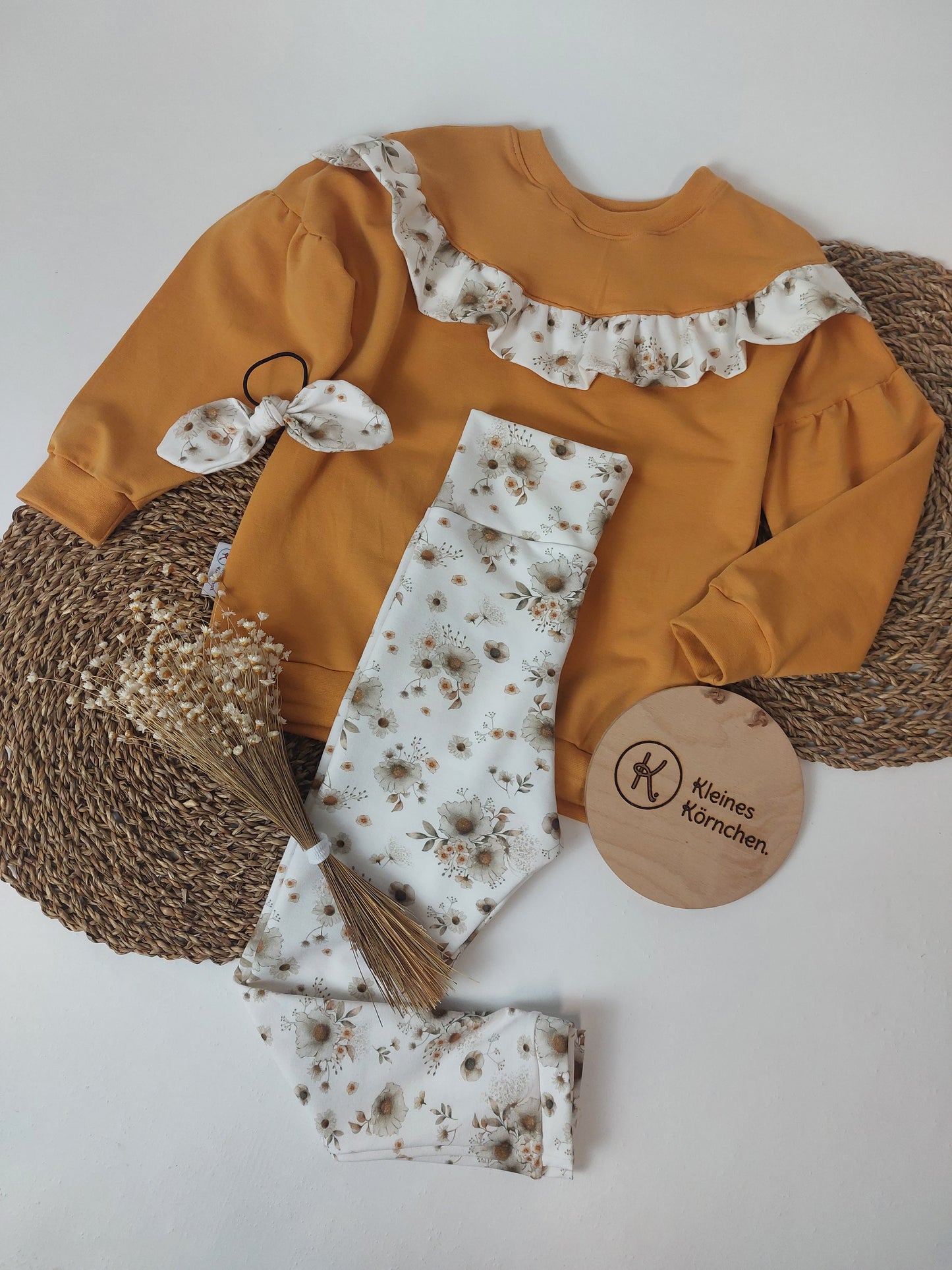 Sweater mit Rüsche